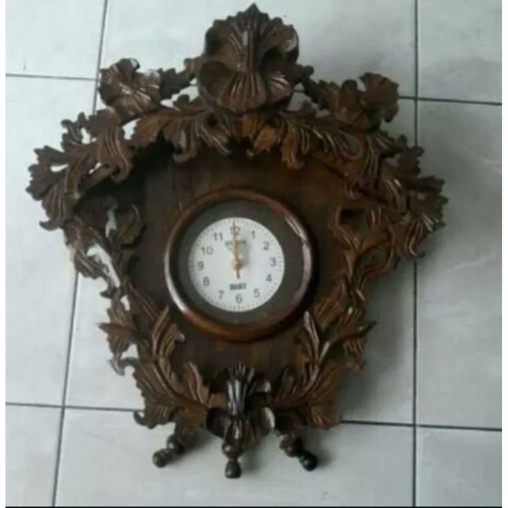 jam dinding antik dari kayu jari