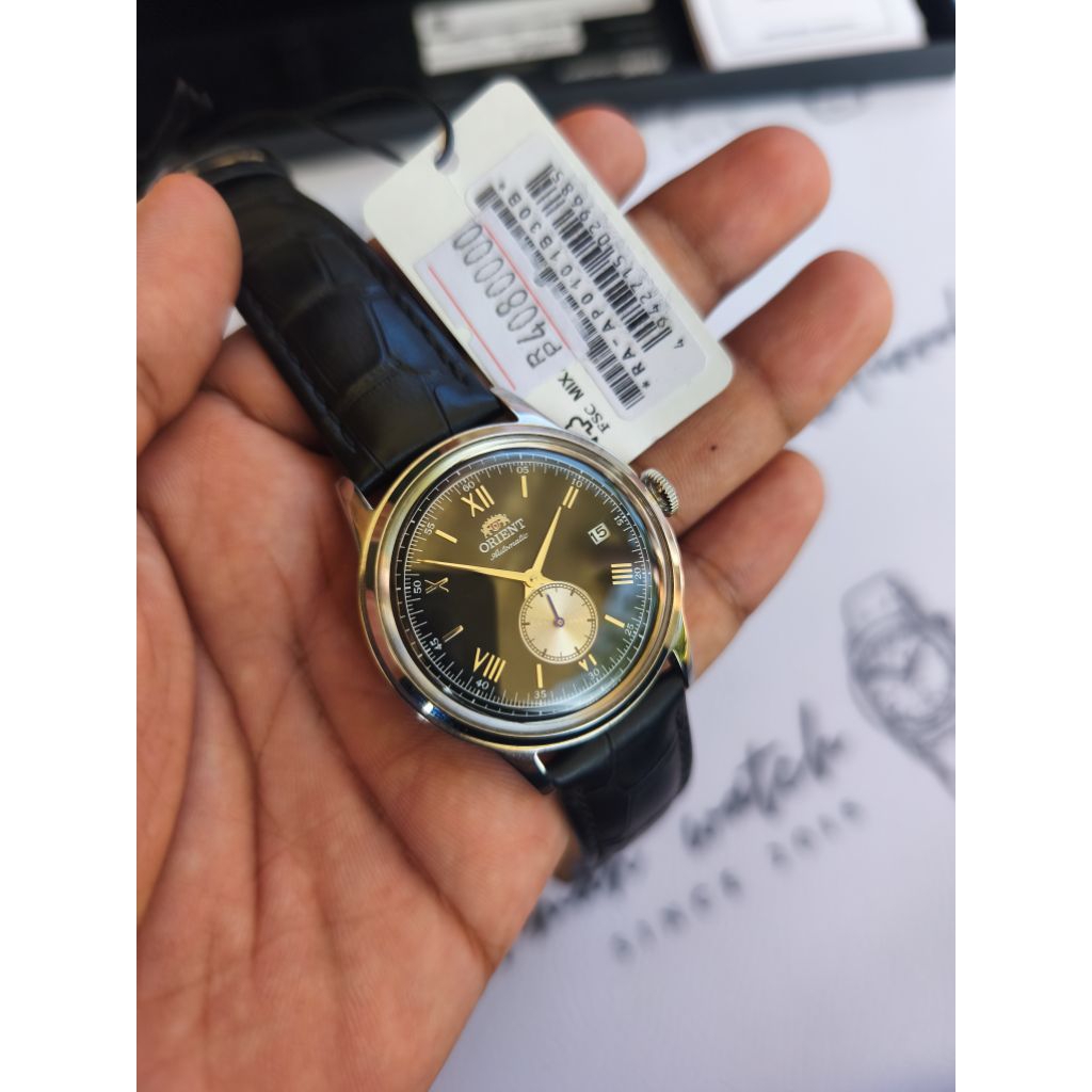 Orient bambino sub second black dial