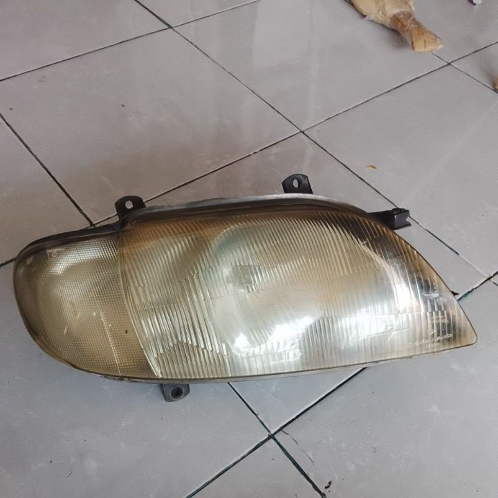 headlamp kanan  Daihatsu taruna original