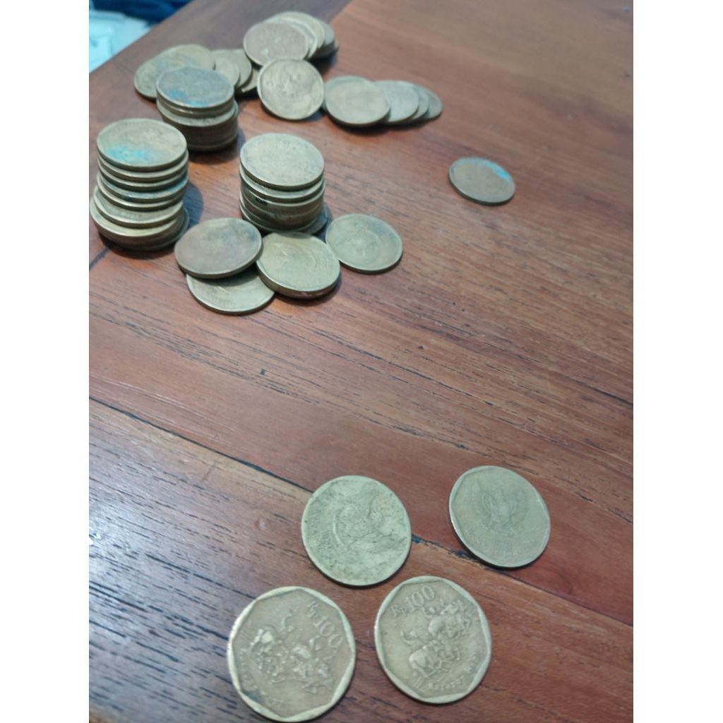 Koin Lama 100 Karapan Sapi
