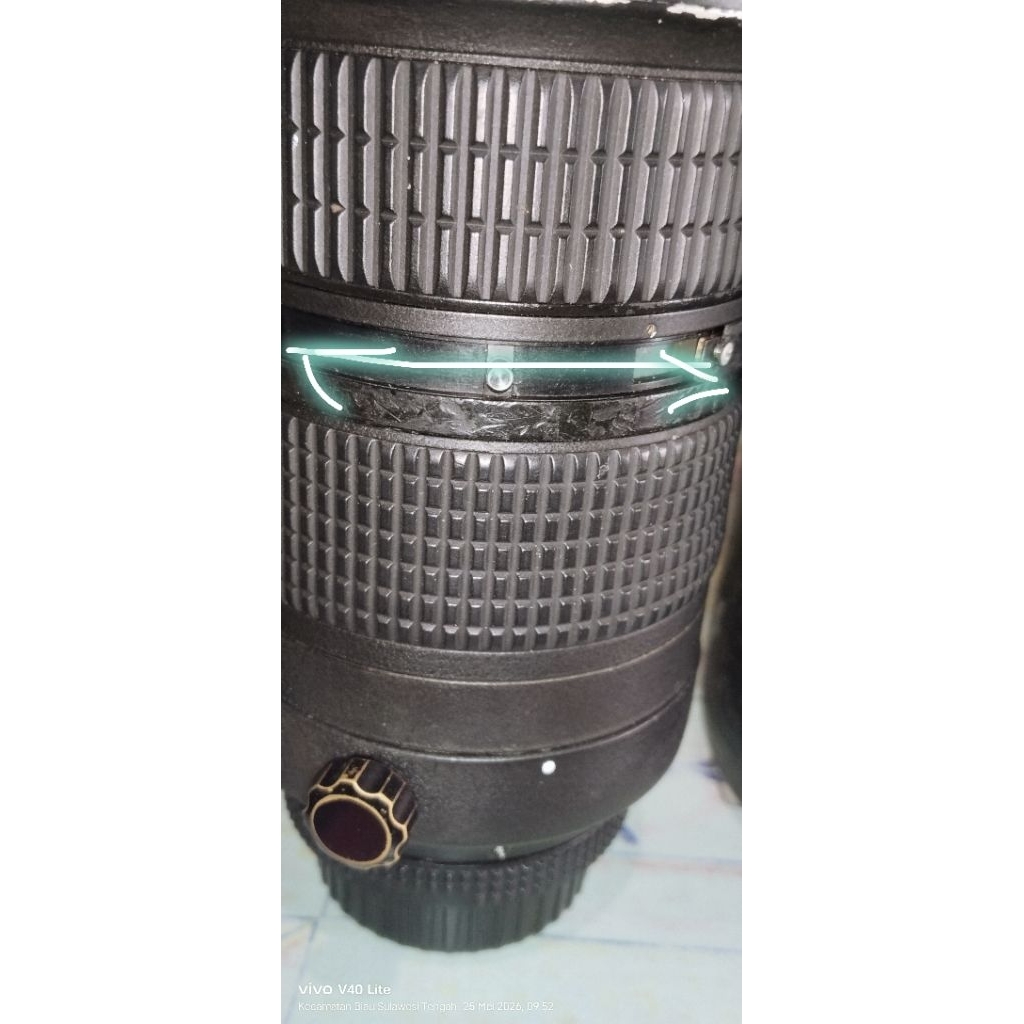 lensa tele nikon 80-200mm f2,8 gen3 minus.