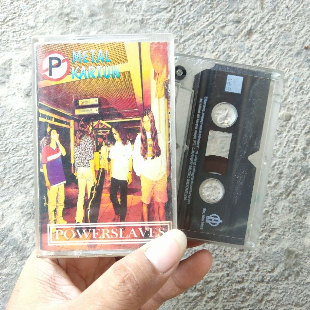 Kaset Pita Power Slaves - Metal Kartun