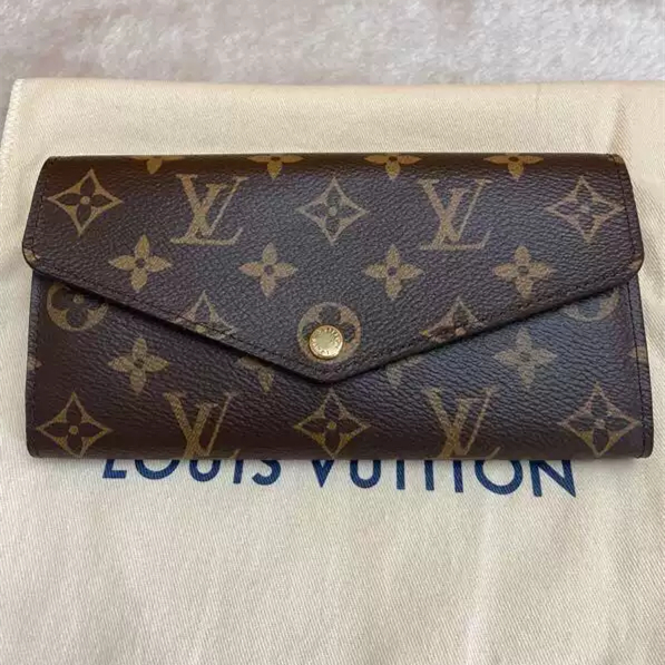 Dompet lipat Louis Vuitton Sarah pre-owned dari Prancis, warna Monogram dengan aksen merah muda (kod