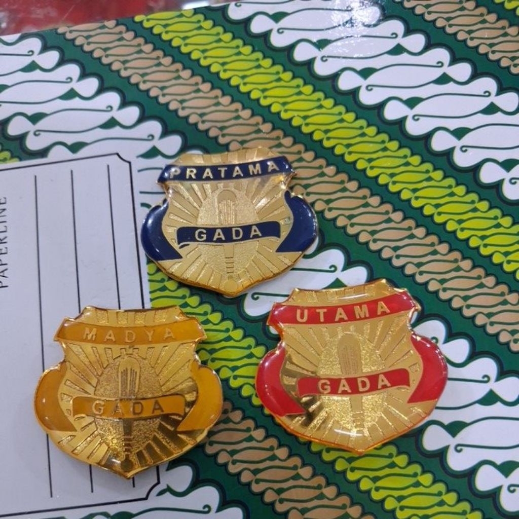 Pin dada satpam
