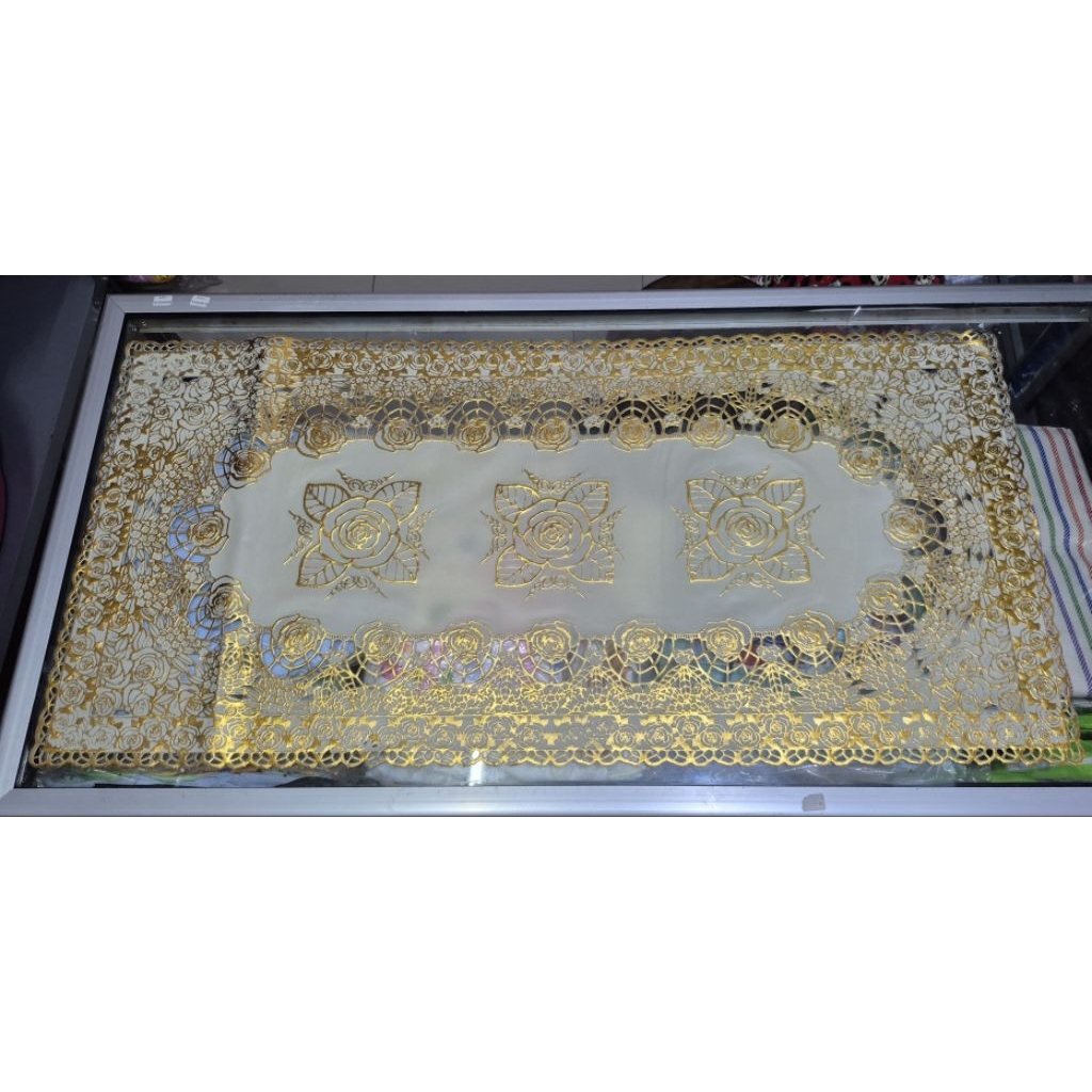 taplak meja tamu plastik perlak emas