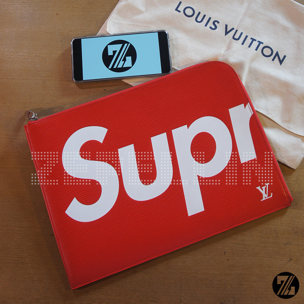 TAS LV X SUPREME POCHETTE JOUR EPI GM RED