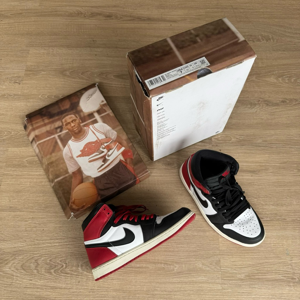Sepatu Nike Air Jordan 1 Retro High OG “Black Toe Reimagined”