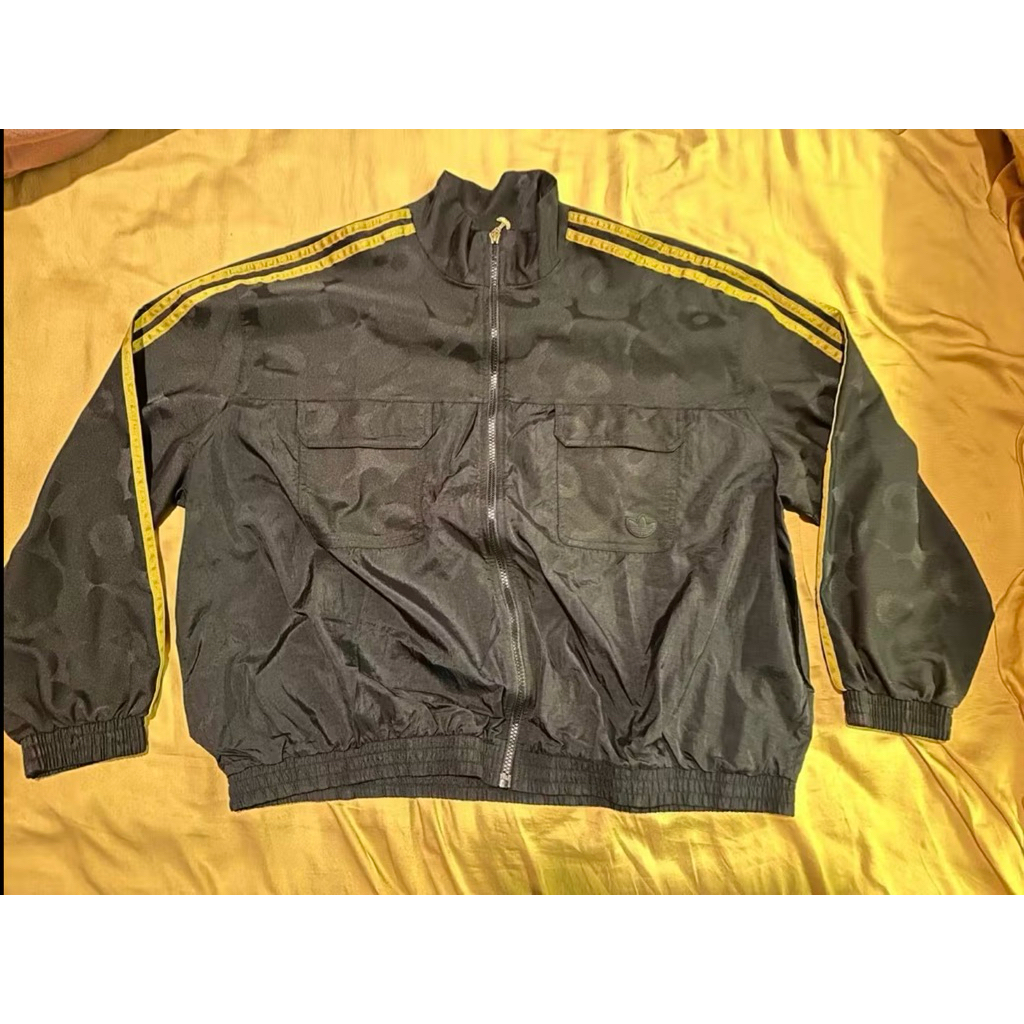 (original, prelove) Adidas x Marimekko Primegreen Track Jacket in black with gold stripes