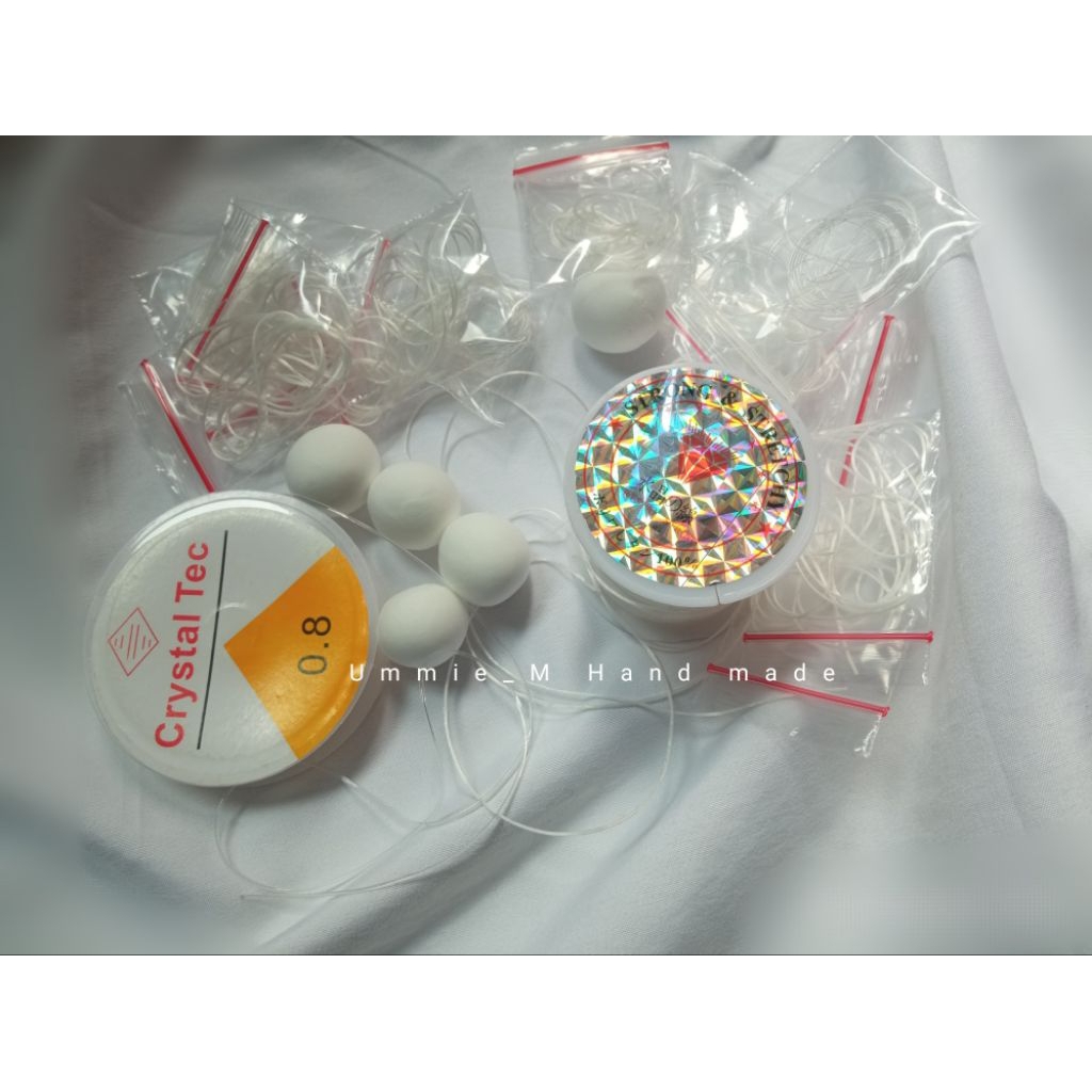 Tali Senar Elastis Crystal Tec Transparan 0.8mm - Fleksibel, Kuat, Mudah Digunakan