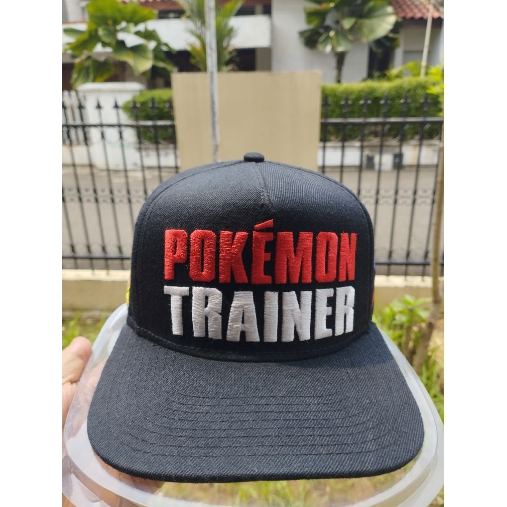 Topi Pokemon Trainer Official 2016