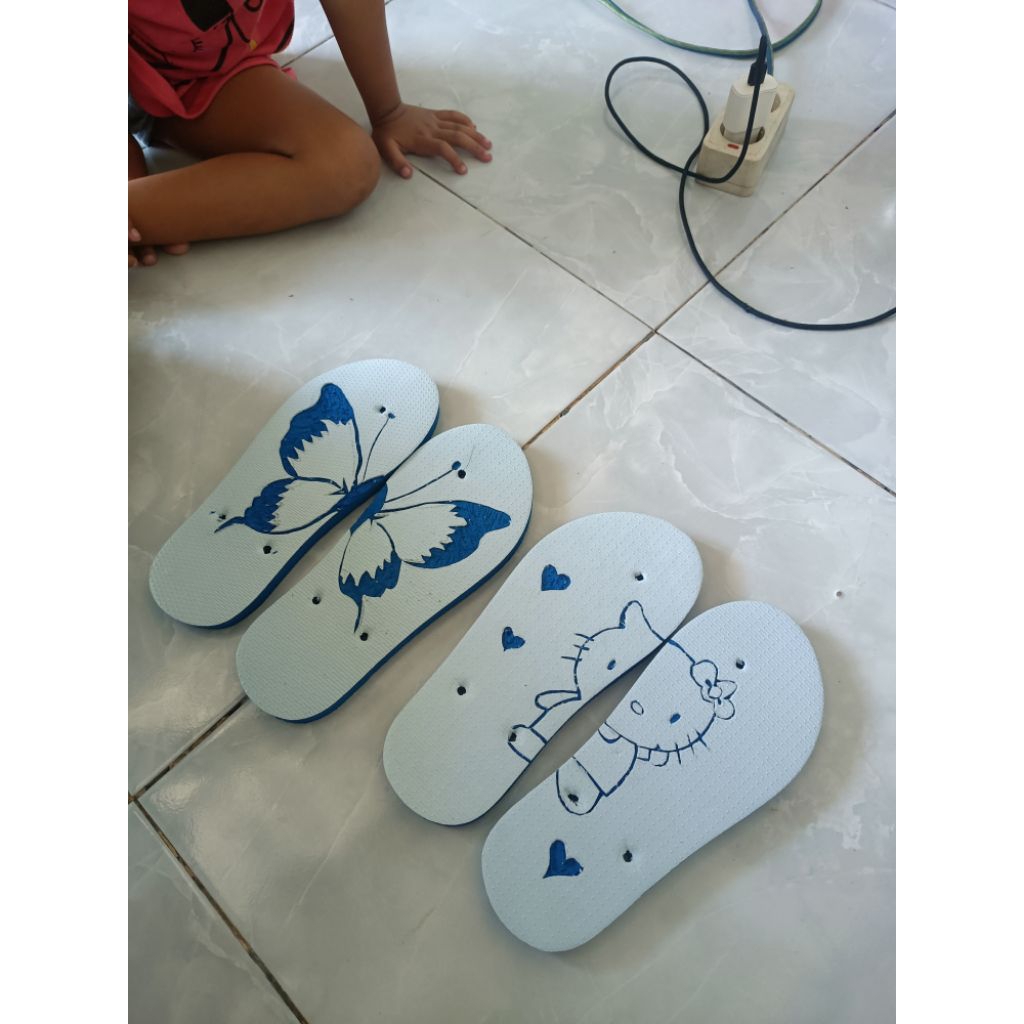 Sandal jepit swallow ukiran