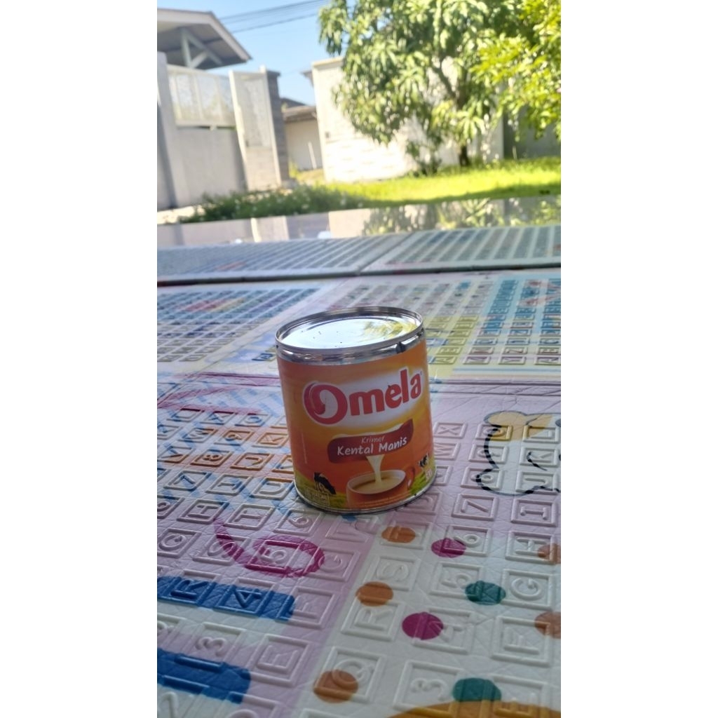 Susu kental manis omela kaleng