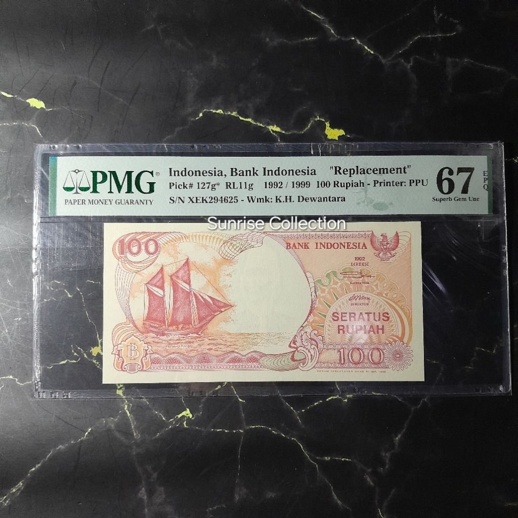 Uang Kuno Indonesia PMG 67 EPQ 100 Rupiah Pinisi Tahun 1992 Seri X Replacement