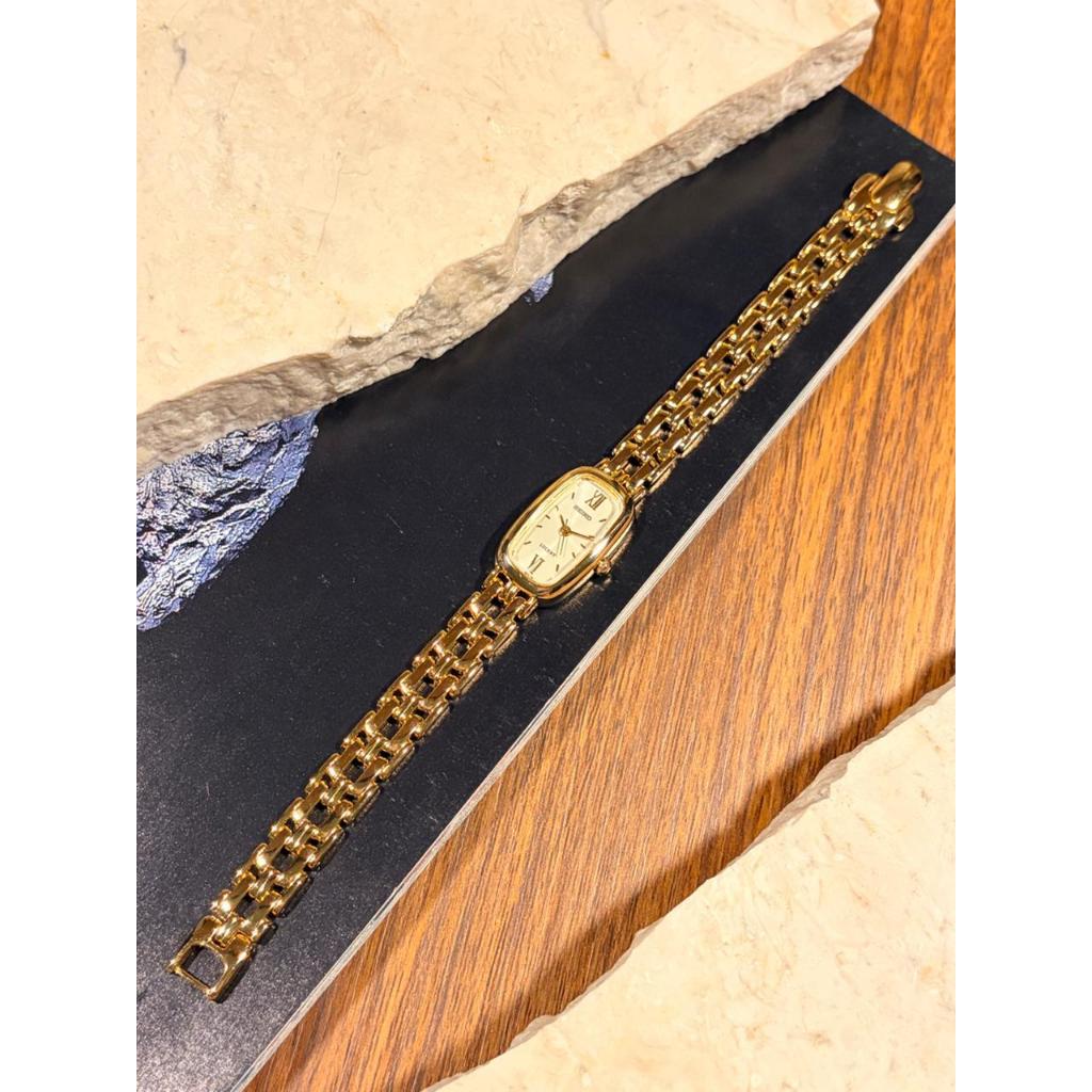 Seiko lucent rectangle shape with sunburst gold dial 4N21-5330