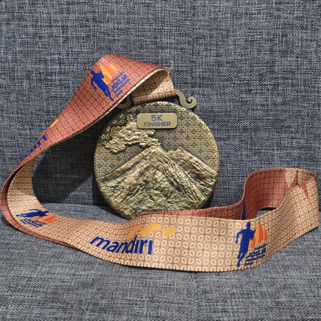 Medali Running Jogja Marathon
2018 5K Finisher