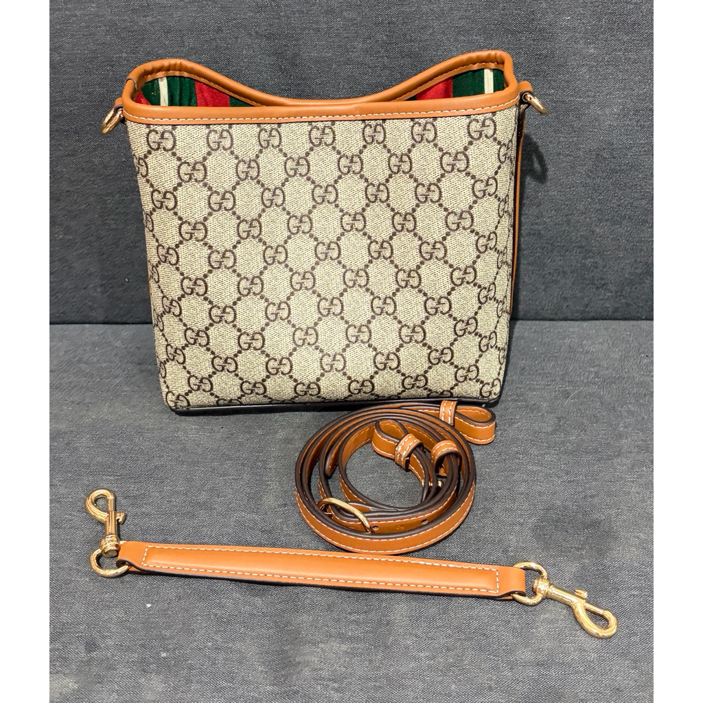 G*cci GG Emblem Bucket Bag