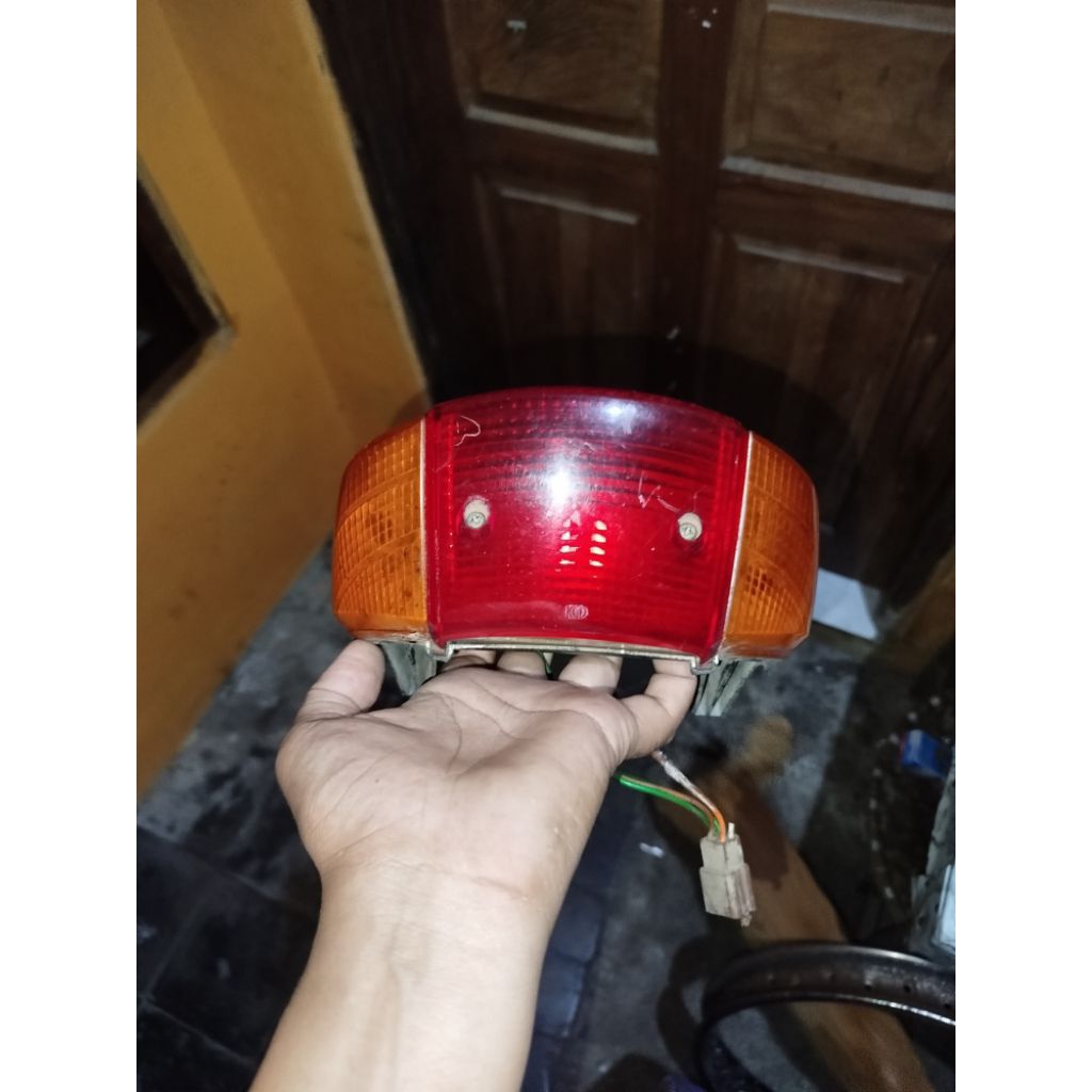 Lampu belakang stoplamp supra x lama original
