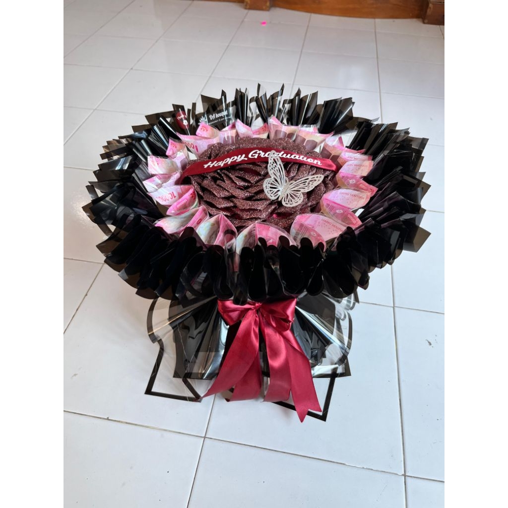 bouquet 1 tangkai jumbo dan uang mainan