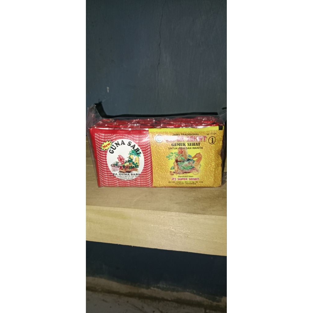 Jamu GunaSari penambah nafsu makan kemasan 30 sachet warna merah kuning.