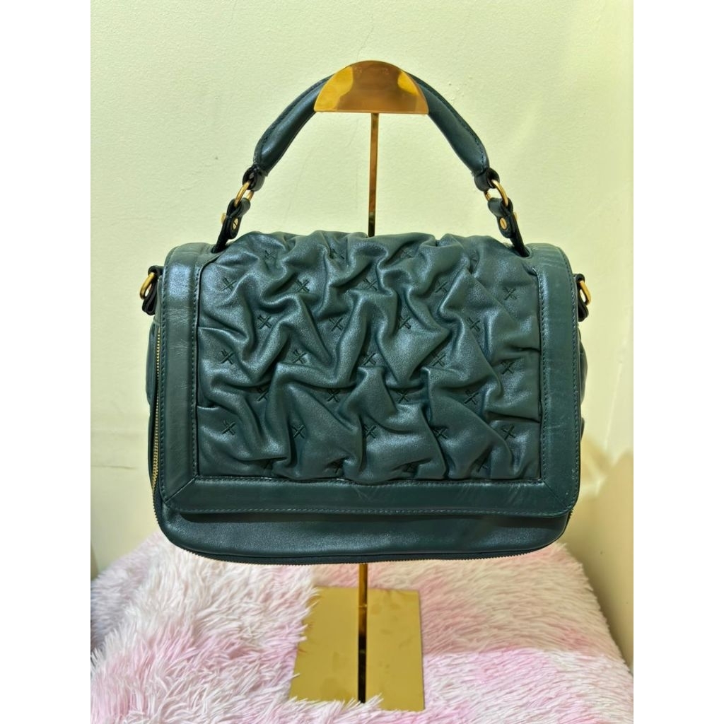 Dissona shoulder bag green