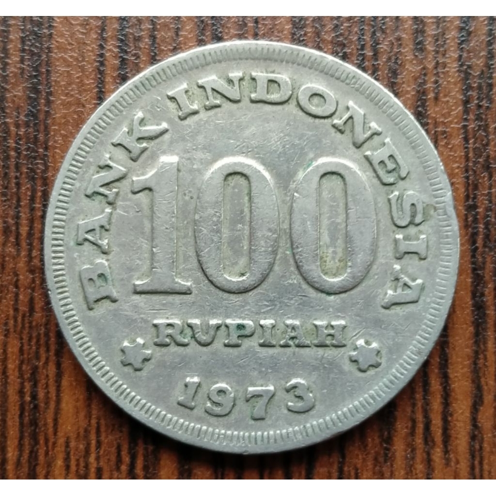 Uang koin kuno 100 Tebel