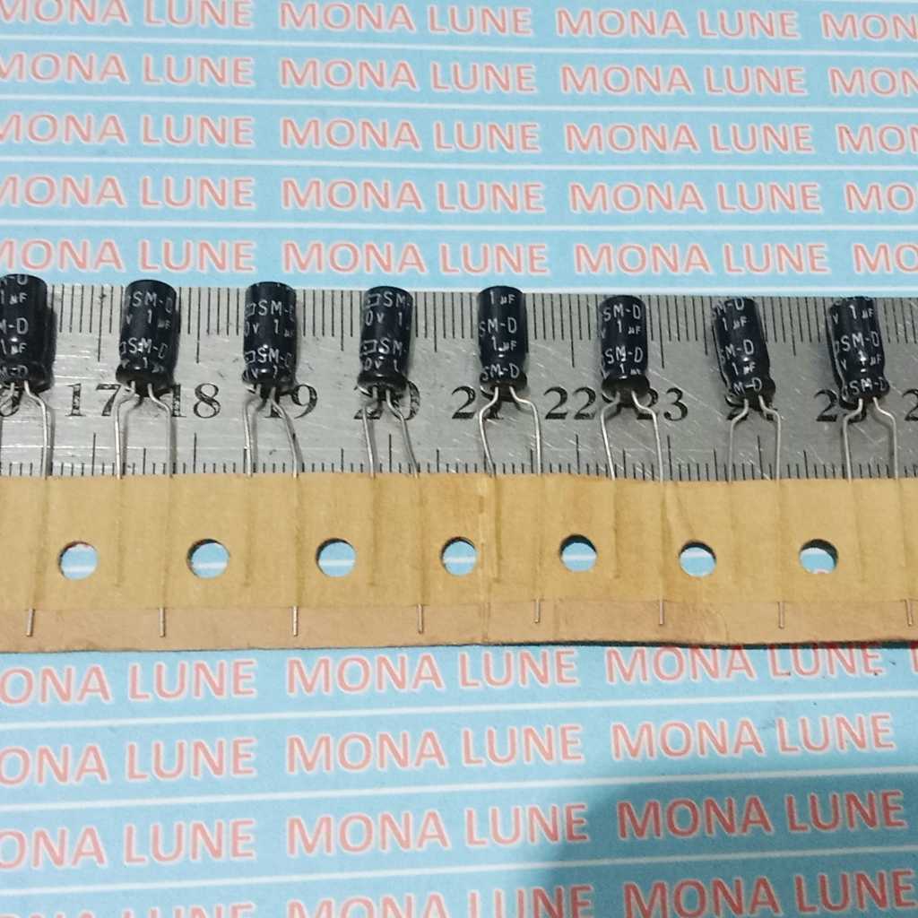BP SM--D  1uf 50V  d5X12mm BIPOLAR HITAM elko kapasitor elco capacitor PERSAMAAN DARI NP NONPOLAR