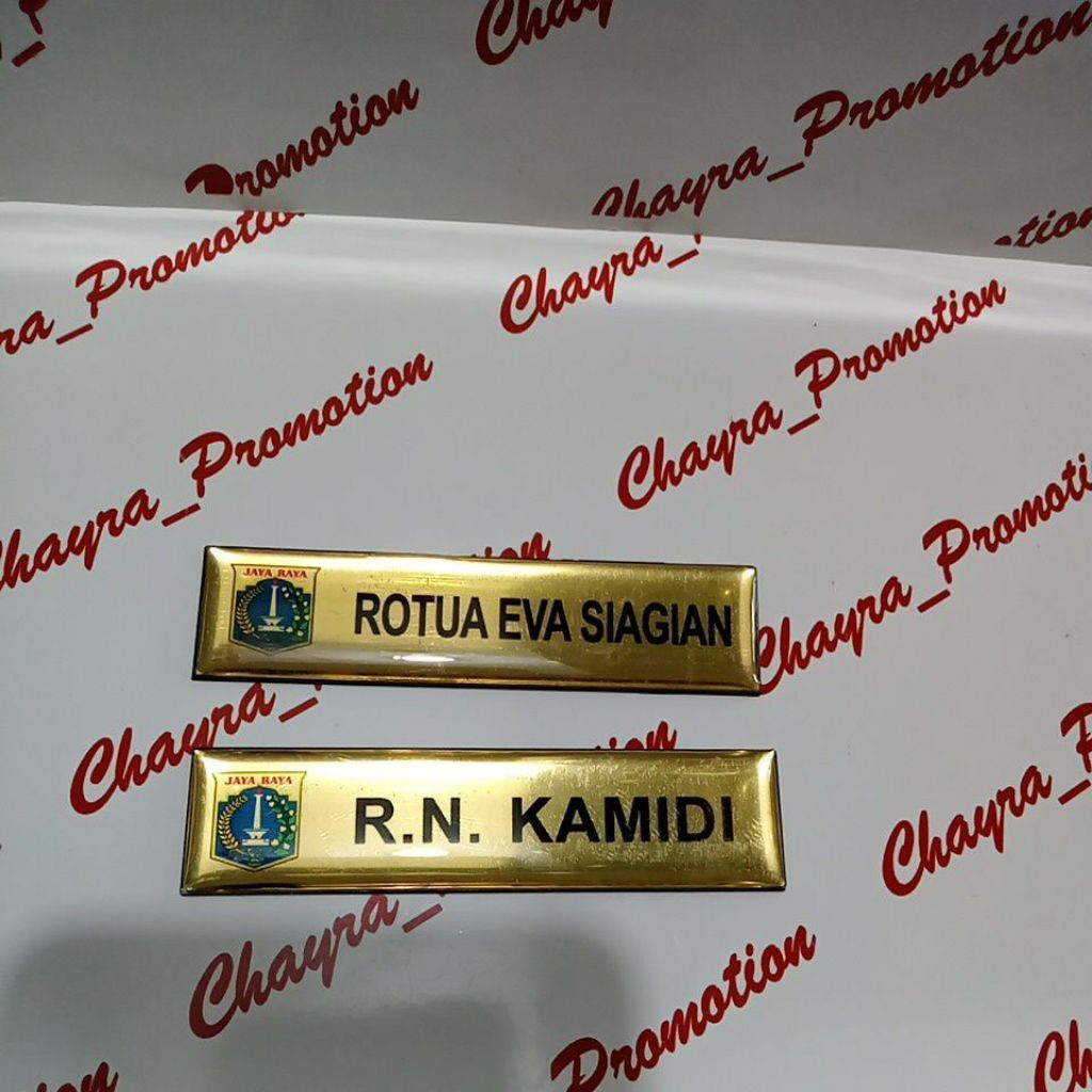 nama dada akrilik gold logo Dki