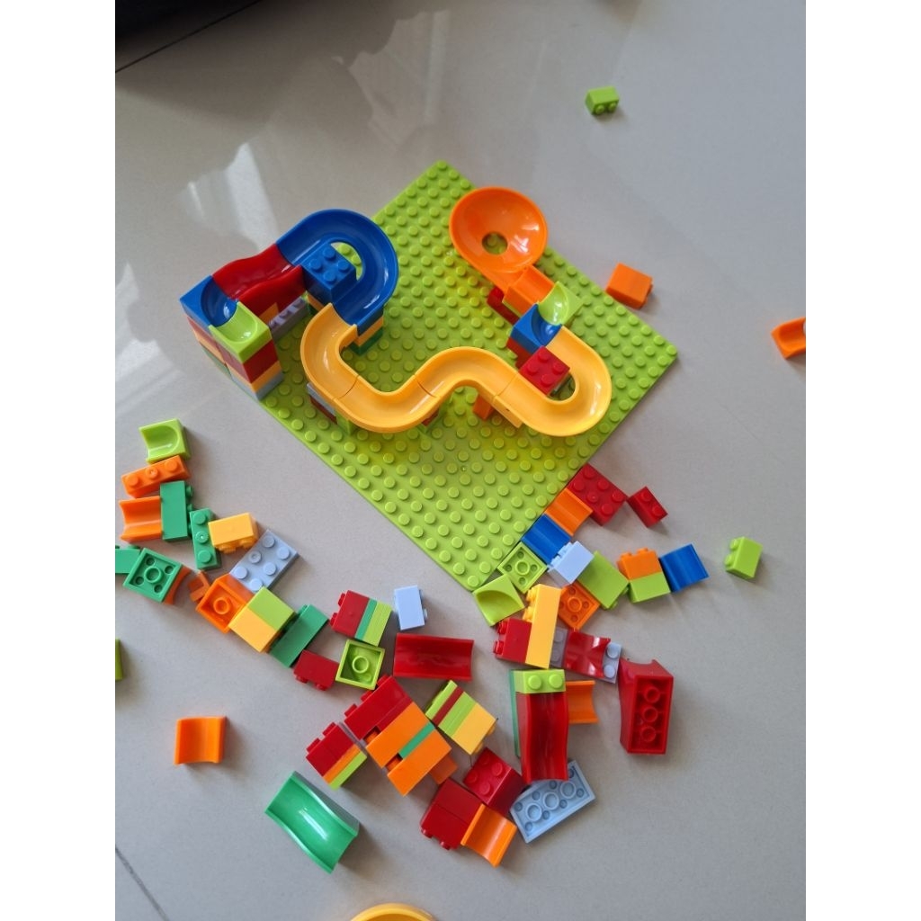 mainan puzzle perosotan lego edukasi anak