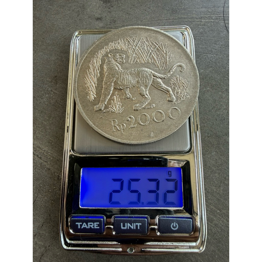 koin kuno 2000 rupiah 1974 macan