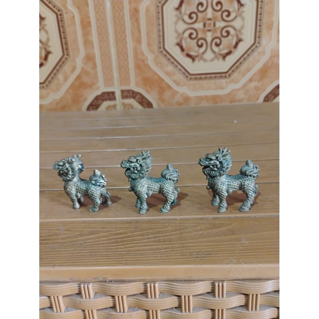 patung singa qilin Kuningan
