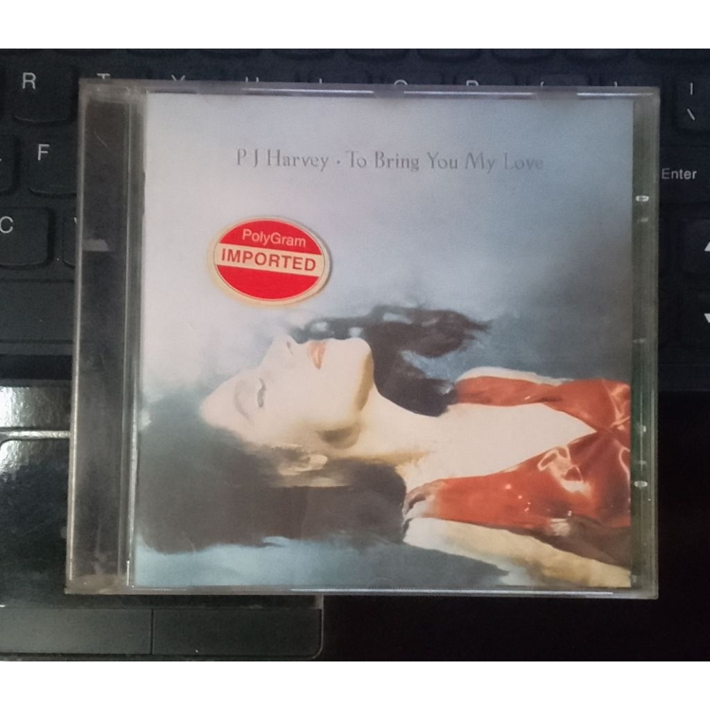 CD Impor Perancis PJ Harvey Album To Bring You My Love
