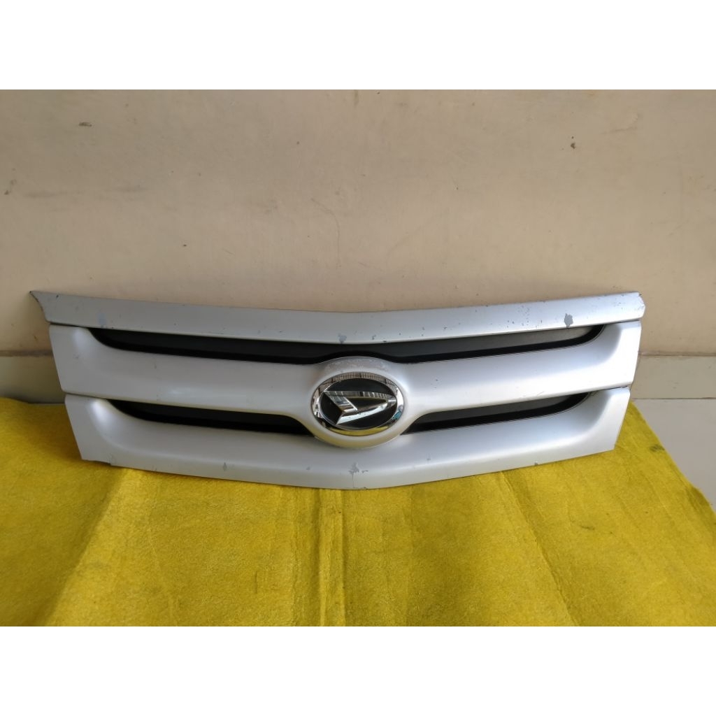 grill bumper depan Luxio ori