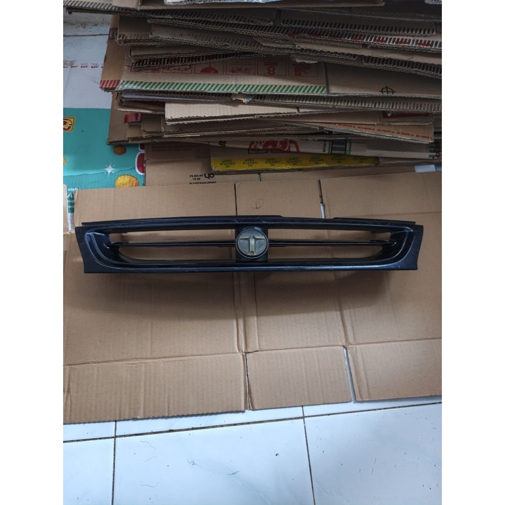Gril bumper gril bemper depan mobil timor timor original