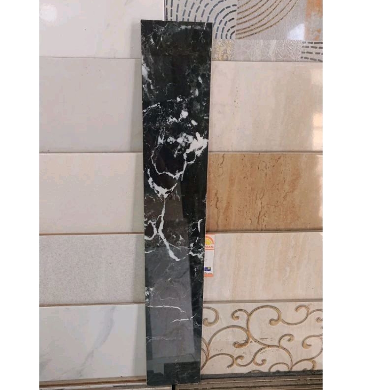 GRANIT 10X60 HITAM MOTIP MARMER
