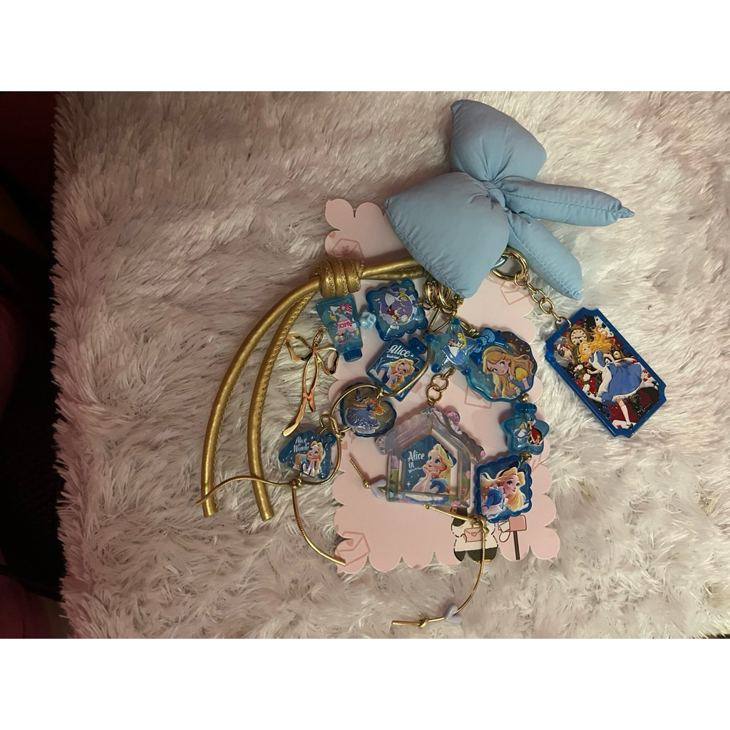 strap tas “alice in wonderland”