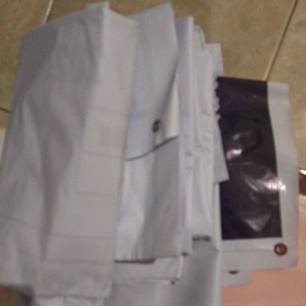 spanduk cacat produksi