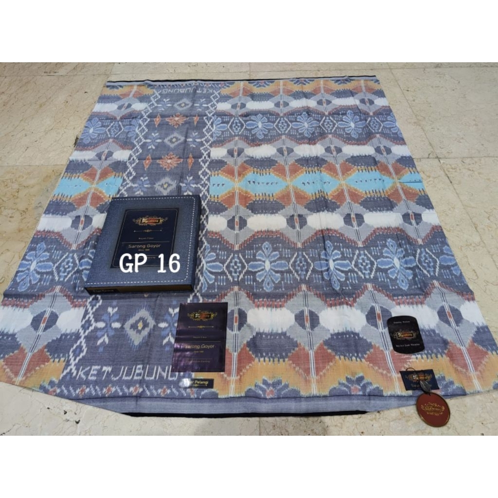 Sarung ketjubung goyor motif pelangi red gold new