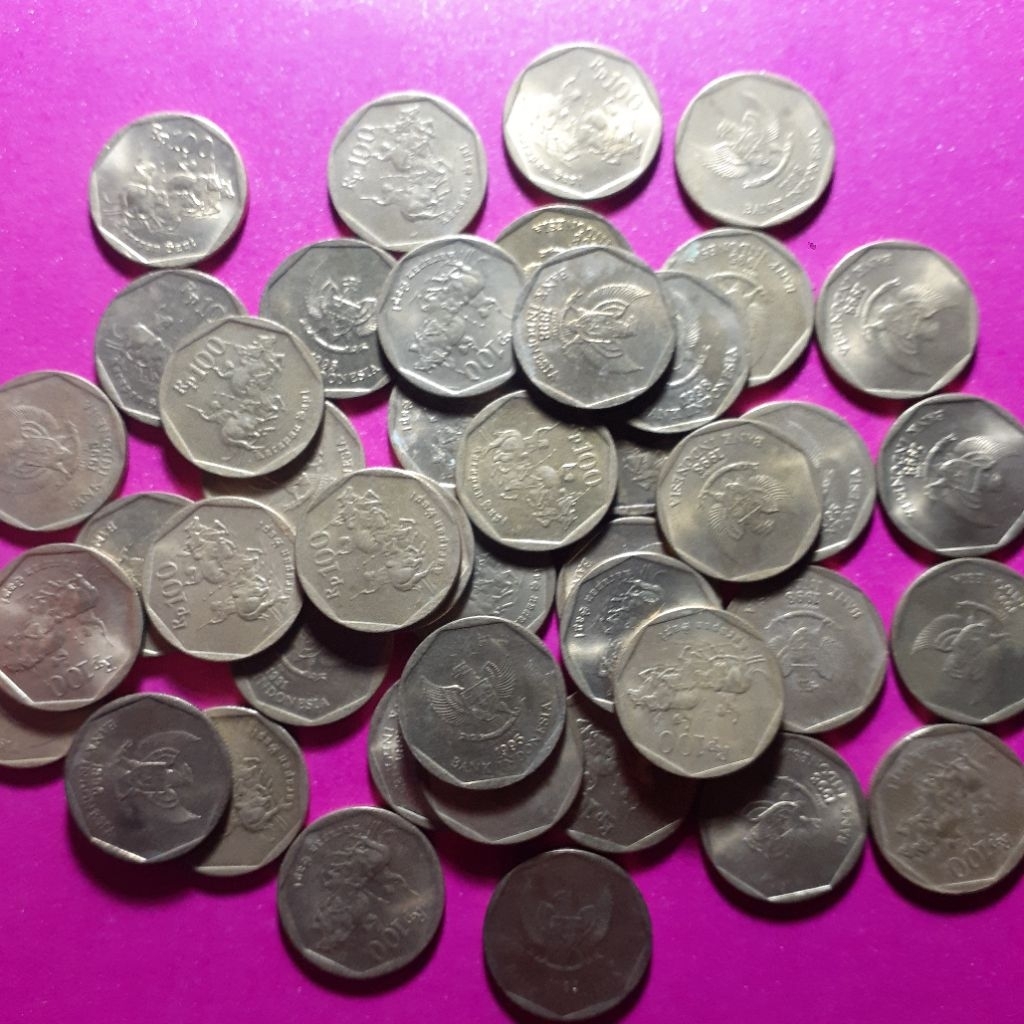 uang koin 100 rupiah karapan sapi