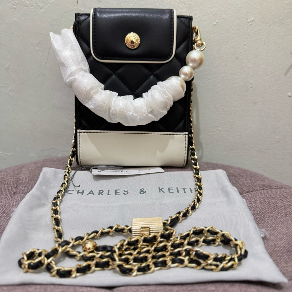 Charles n Keith xs black white sling bag