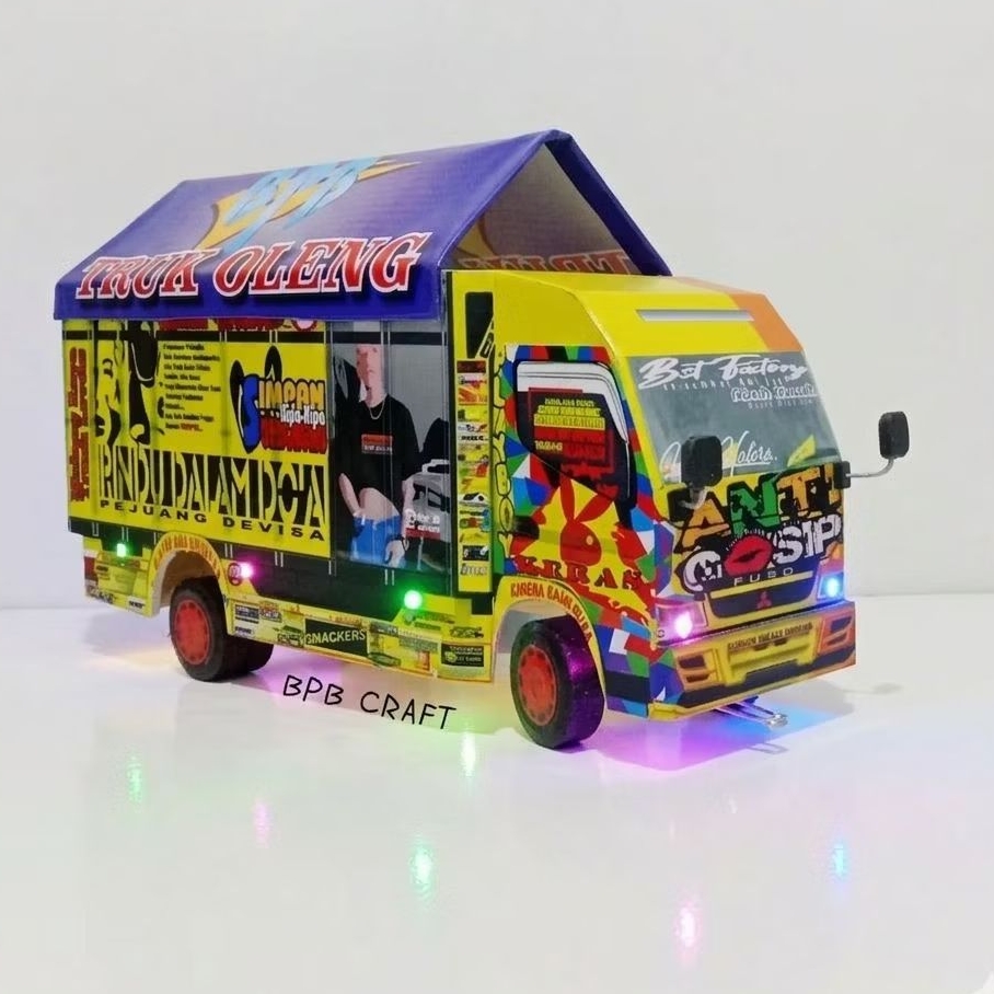 Mainan miniatur truk oleng anti gosip