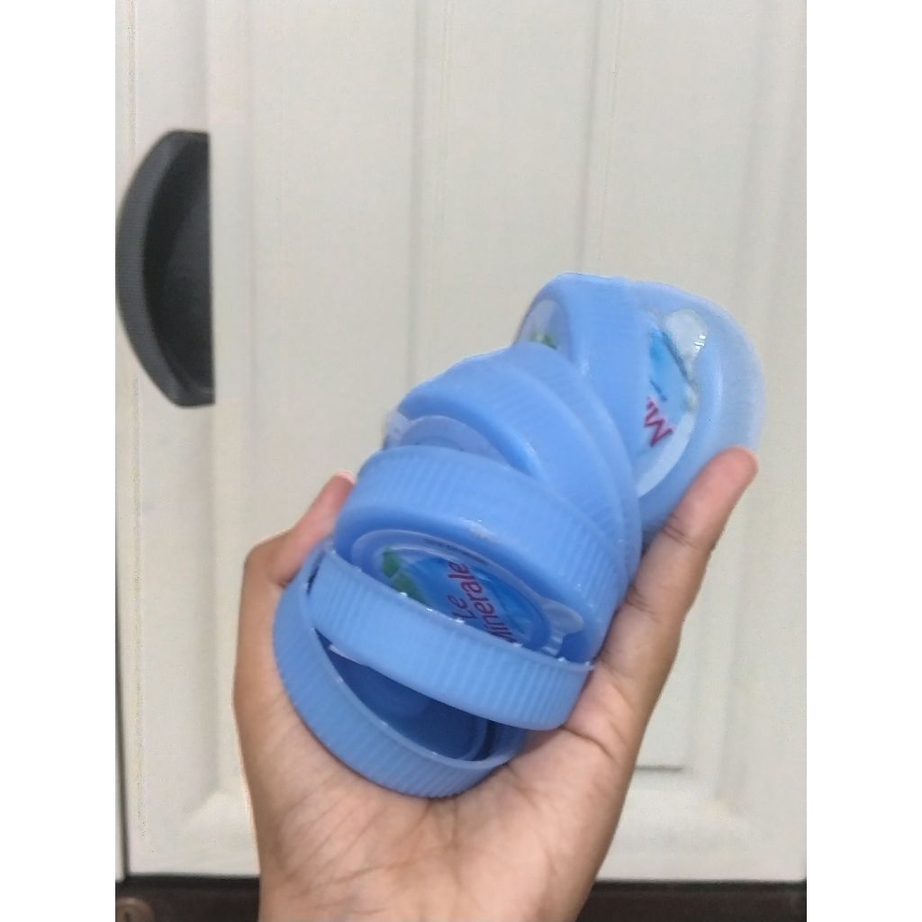 Tutup galon le mineral bekas/preloved