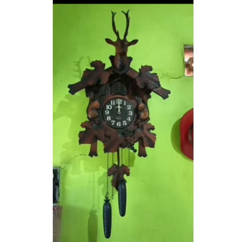 Jam kuno kikuk cuckoo Rhythm baterai besar