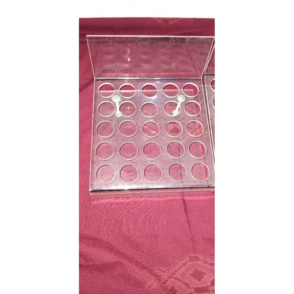 Display tatakan botol parfum roll on