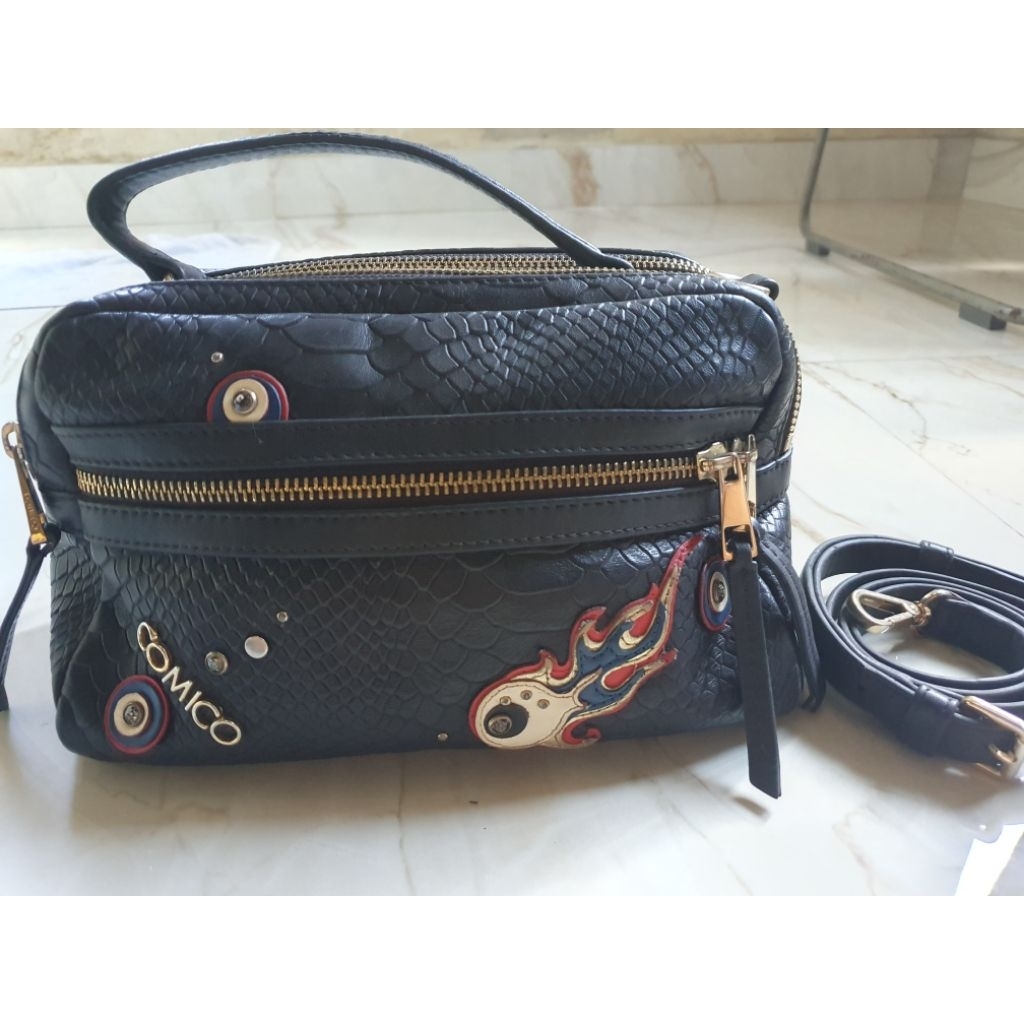 Comico sling and hand bag