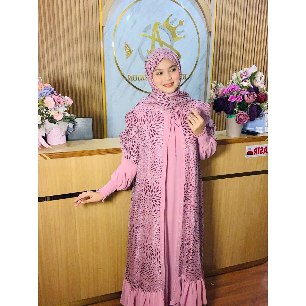 Gamis Elegan dengan desain motif leopard dan lengan ruffle untuk tampilan mewah dan modis