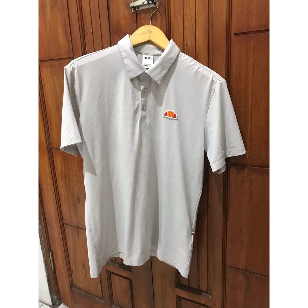 Baju Polo putih