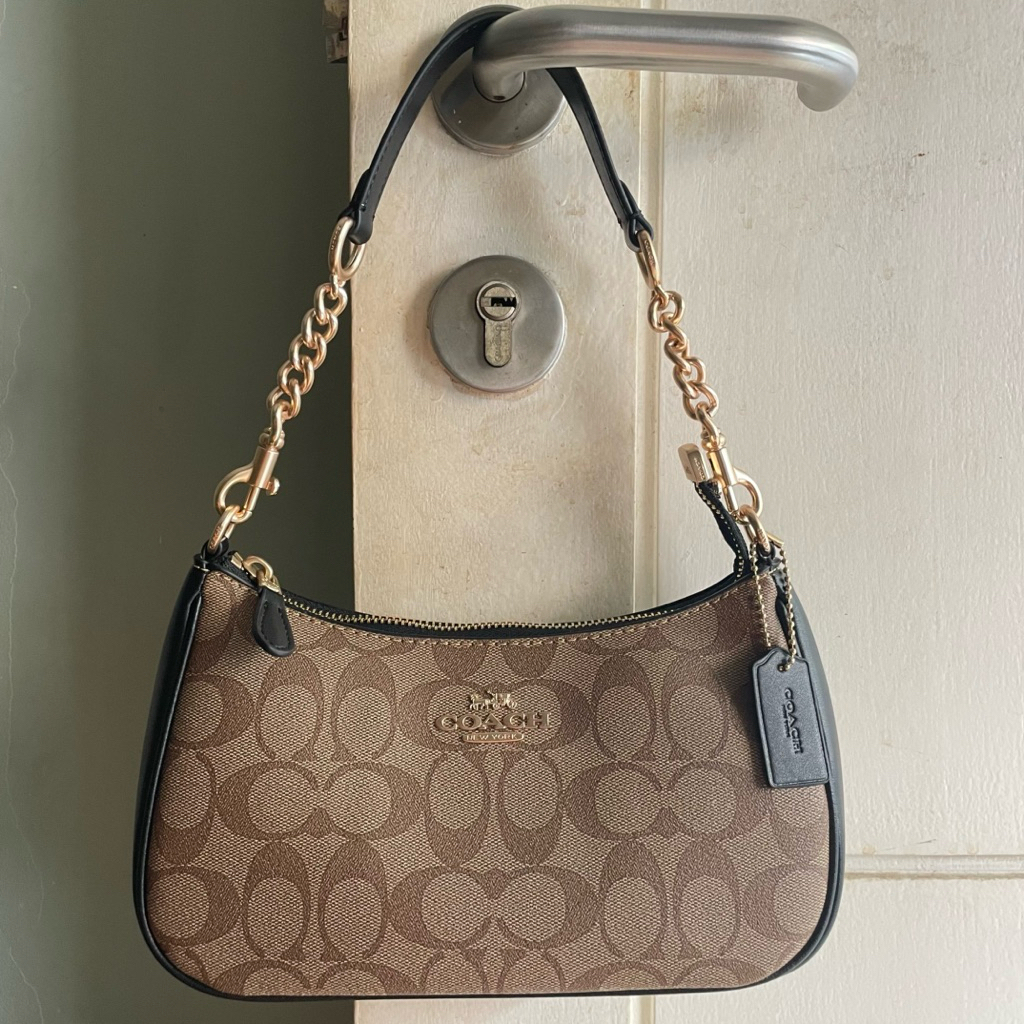 Preloved coach Teri khaki