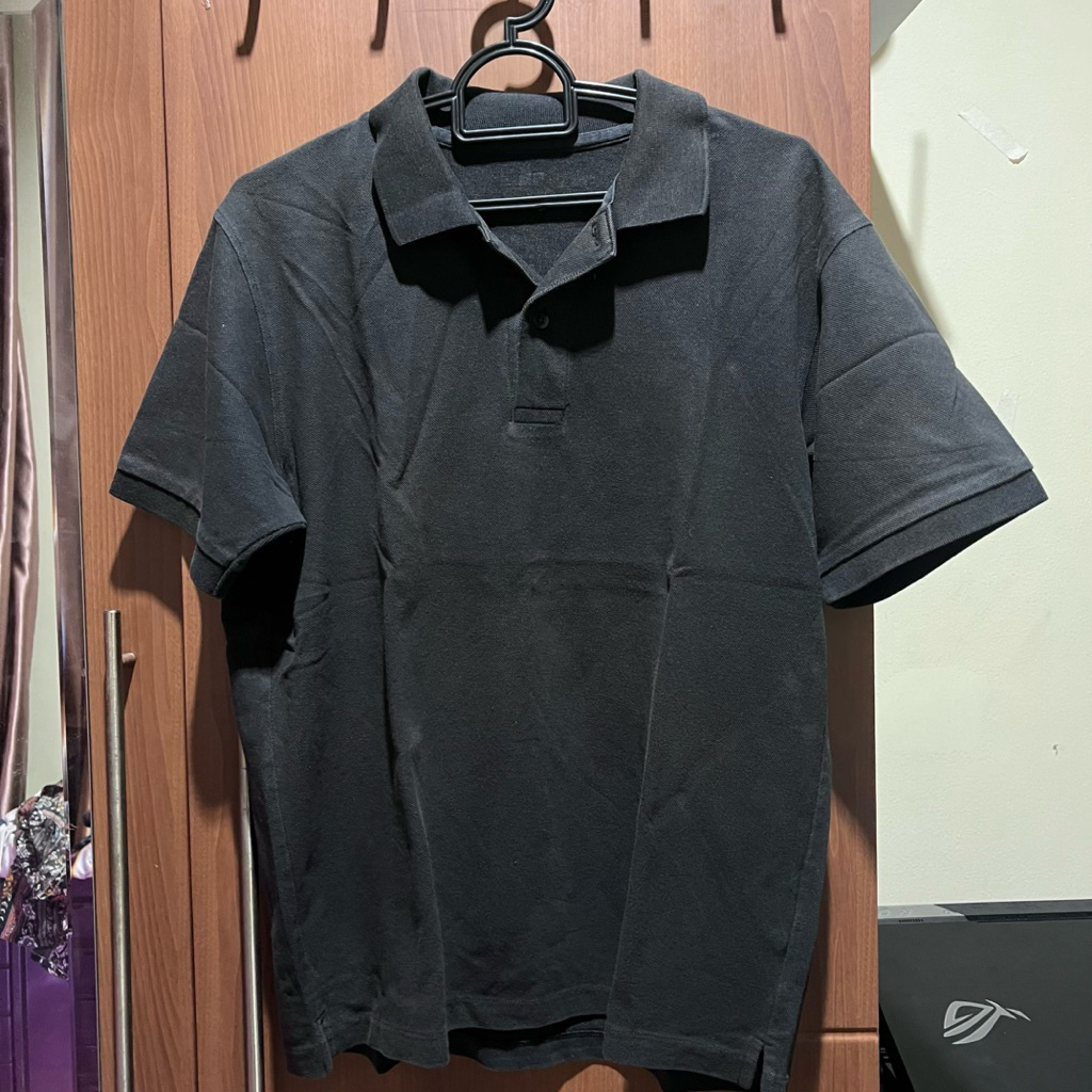 uniqlo polo black n garis