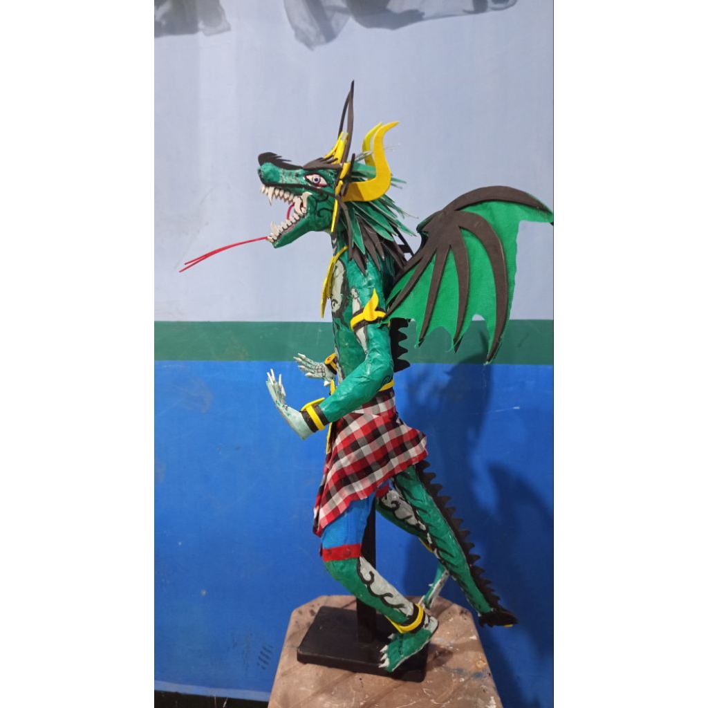 Miniatur ogoh ogoh naga hijau