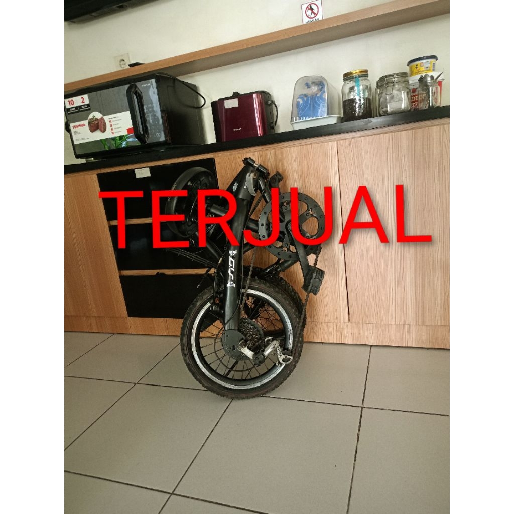 (SUDAH TERJUAL ). sepeda lipat 16 bekas